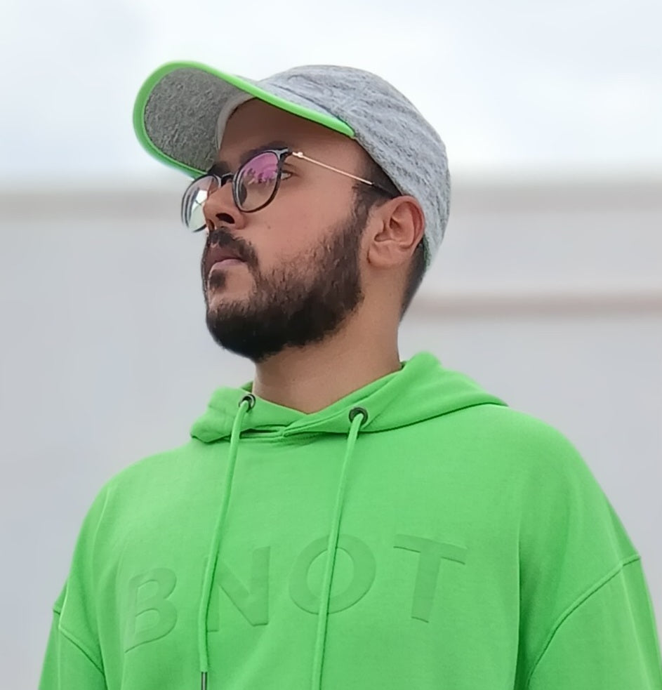 Bnot silicon puff print  can be seen which looks like embosing ,on bamboo green unisexhoodie.
